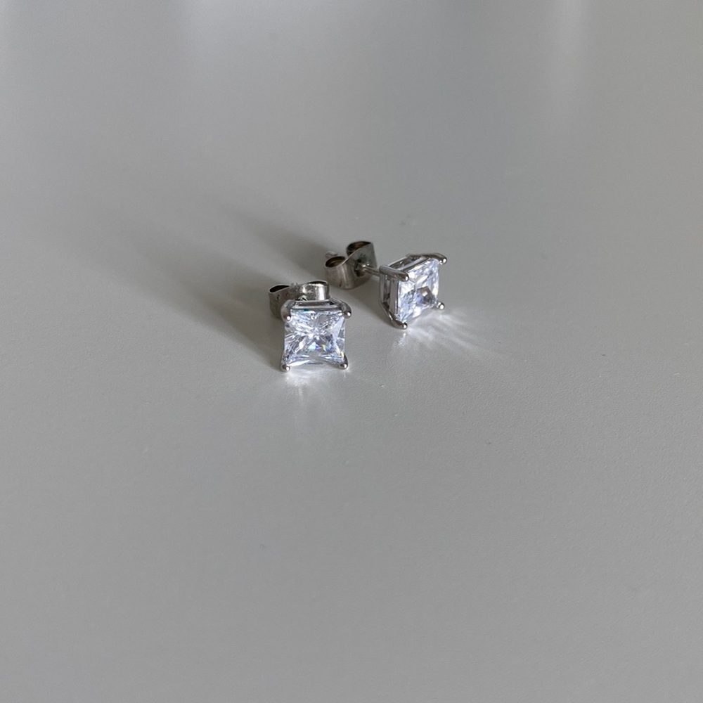 Diamond sterling silver earrings. medium sized